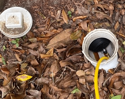 Smoke test looking down exposed PVC piping