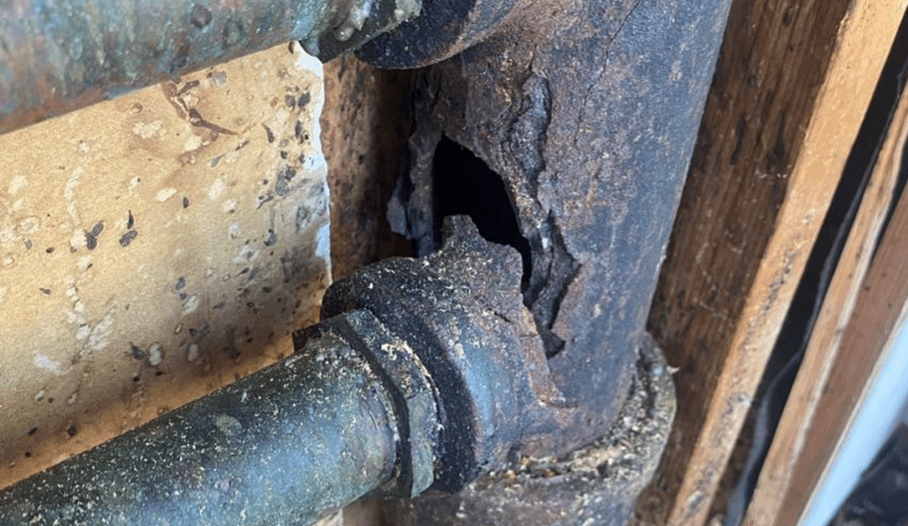 Broken, rusted pipe