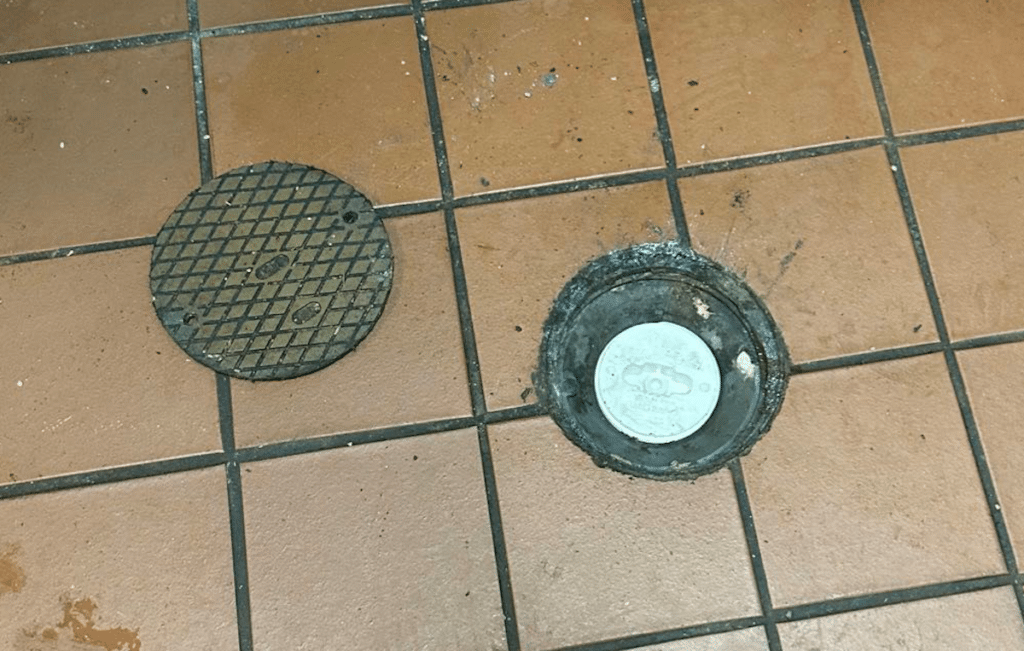 Image of drain cover off drain